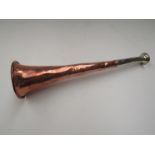 An early 20th Century brass and silver plated hunting horn by Kohler and Son of London, 23cm long,