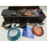 A small mahogany box with miscellaneous bijouterie including miniature lighter,