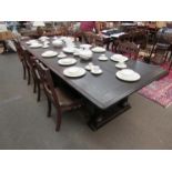 A large 17th Century revival oak banqueting/refectory dining table on turned legs and sledge feet,