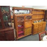 A Bedemeier style bird's eye maple cabinet,