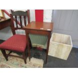 A 19th Century mahogany sewing table with lift up top,