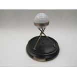 A Harry Clifford Reed "Hole-in-One" Dunlop golfing trophy on stand,