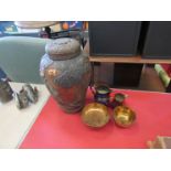 An Oriental ginger jar with figural detail, damage to rim,