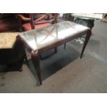 A 1970's mirror top table