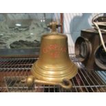 A "Corella 1966" brass ships bell