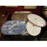 Three ceramic drainage trays including blue and white pogoda scene and a silver plated serving tray