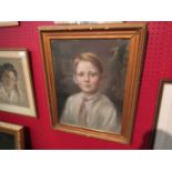 A pastel portrait of young boy, indistinctly signed lower left, gilt framed and glazed,