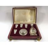 A silver plated cased communion set