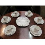 An Art Deco Sutherland china part tea set marked 1778 to base,