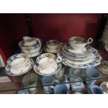 A Wetley china teaset with blue border and floral decoration
