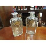 A pair of George III gilt engraved decanters,