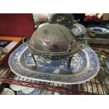 A silver plated food warmer and a Victorian "Willow" pattern meat plate a/f