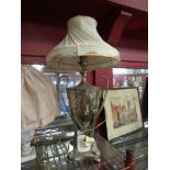 A silver plated table lamp and a marble style example,