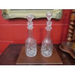A pair of heavy cut glass Victorian decanters with stoppers