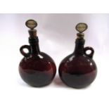 A pair of Brandy and Whiskey decanters with labelled stoppers