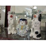 A Dutch Toby jug in the form of a female wearing a Tricorn hat and two Staffordshire jugs