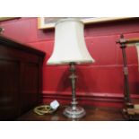 A silverplate on copper table lamp with shade,