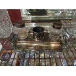 A silverplate desk stand with twin inkwells