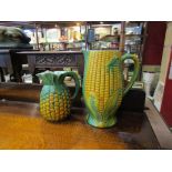 A Majolica corn design jug 28cm tall and pineapple jug,