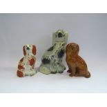Two Victorian Staffordshire dogs and a Victorian brown stoneware Staffordshire dog