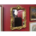 A gilt framed wall mirror with acanthus detail,