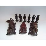 Decorative carved wood Oriental figures and masks