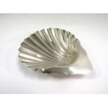 A Francis Higgins silver shell shaped dish,