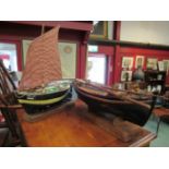 Two handbuilt model boats, "Albion" and "Nellie" both on display stands,