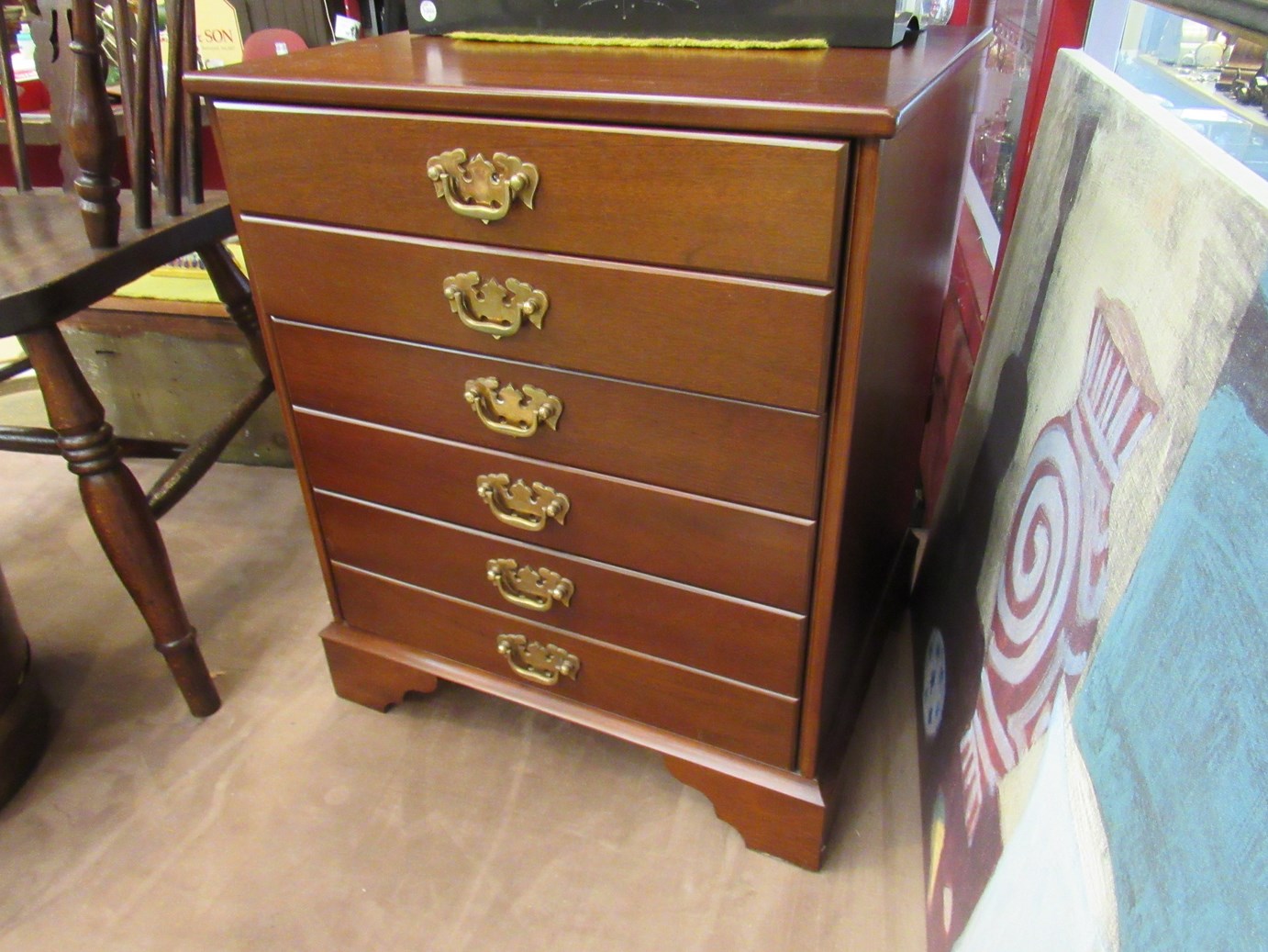 A three drawer faux front C.D.