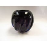 A cobalt blue art glass vase of wrythen form,