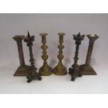Three pairs of candlesticks including copper and brass