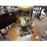 An ornate brass framed easel back dressing chest bevel edged mirror,
