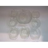 An apple form glass dessert bowl and seven dishes