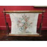 A circa 1840 mahogany tapestry needlepoint work stand with lidded thread box base,