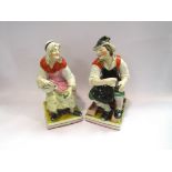 A 19th Century pair of figurines, cobbler and maid,