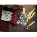 A set of six silver teaspoons with various maker's marks together with other plated cutlery