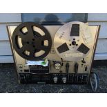 An Akai 4000DB reel to reel tape recorder