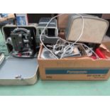 A Bolex-Paillard M8 projector, Braun slide projector and assorted film reels,