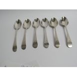 A matched set of six Georgian silver spoons with monogrammed handles, various makers and dates,