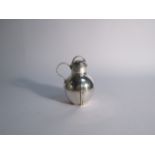 A Walter & John Barnard silver milk can, London 1895, 9.