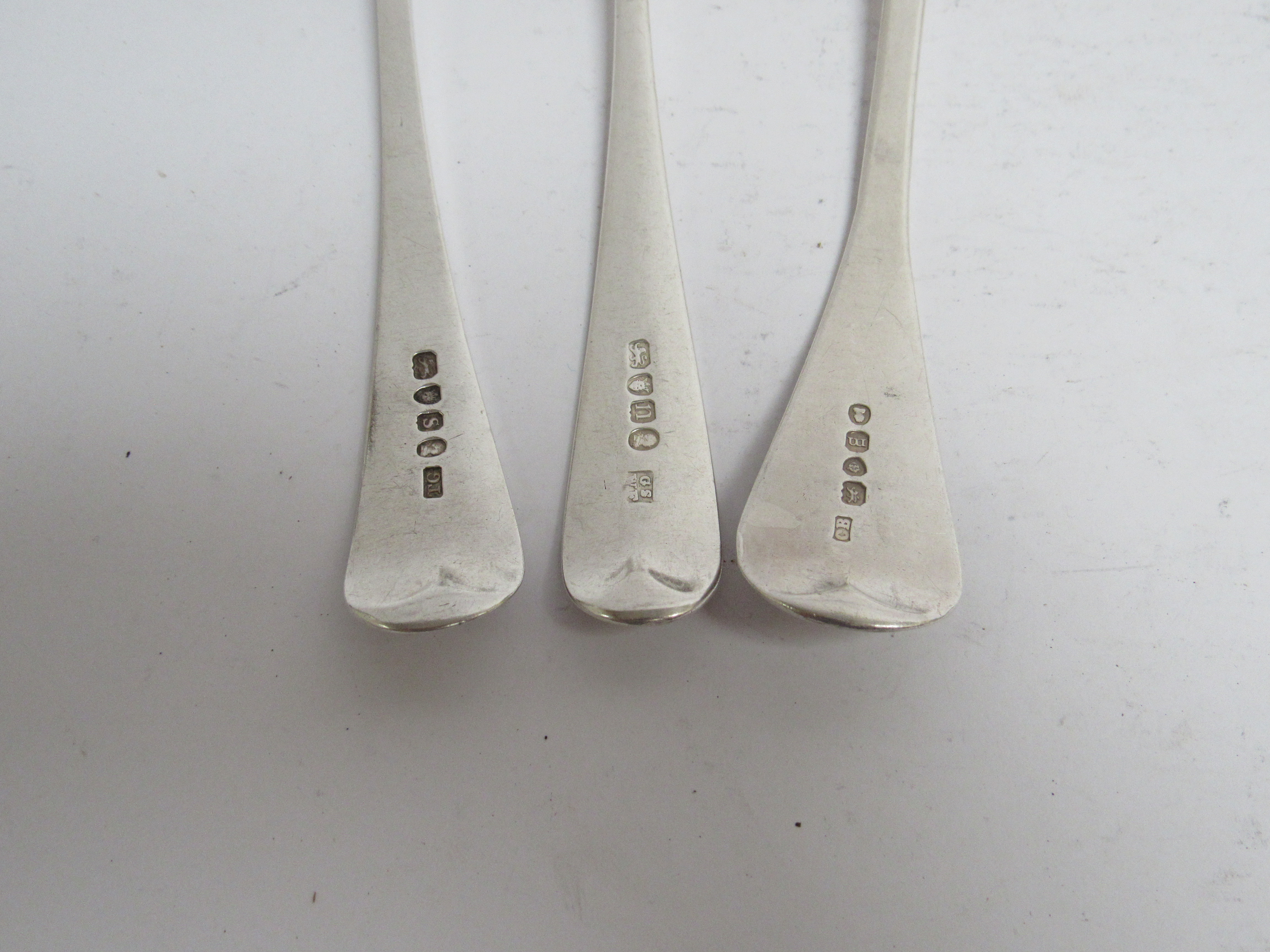 Six various Georgian serving spoons, five with monogrammed handles, - Image 4 of 5