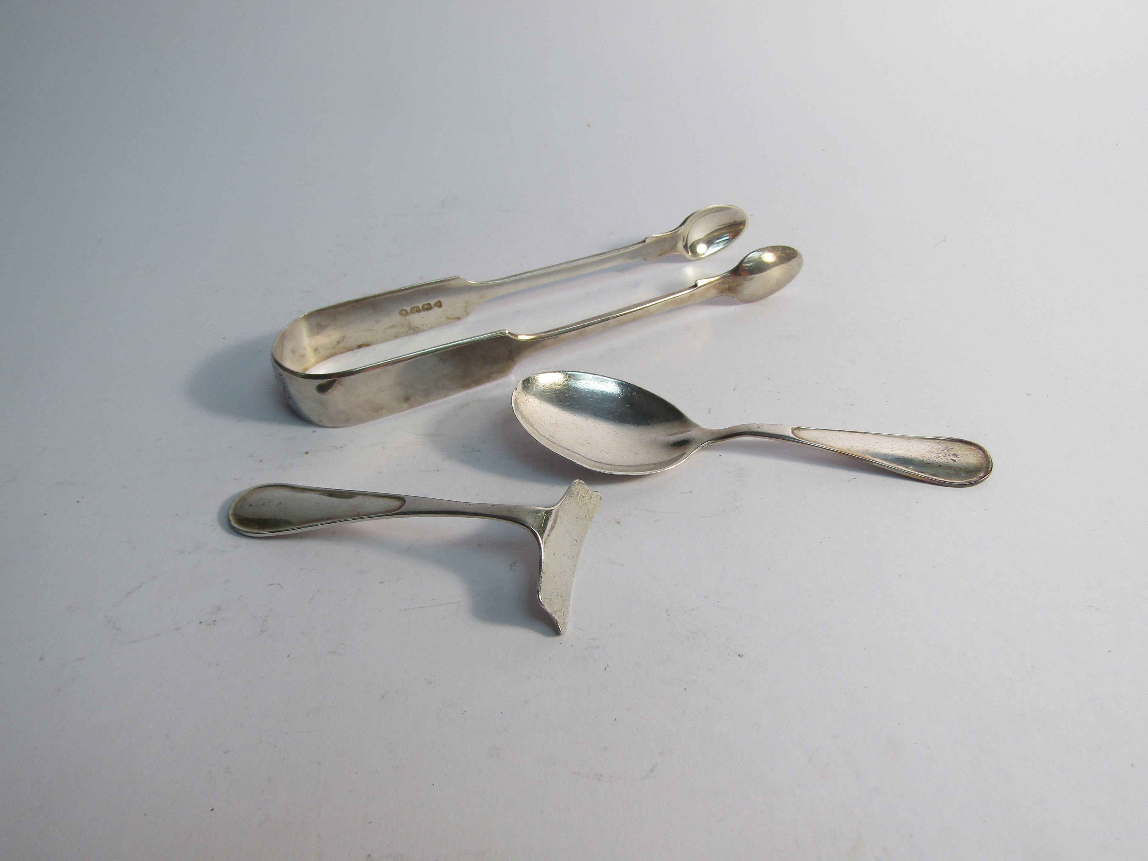 Silver sugar tongs and childs feeding spoons (3) 70g