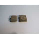 Two silver Vesta cases with all over engraved detail, both 5cm tall, one monogrammed,