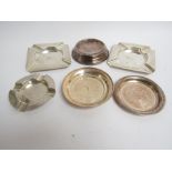 Four silver ashtrays and two silver pin dishes various makers and dates, one with weighted base,