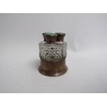 A silver guilloche three bottle perfume holder, imperfections to guilloche and chips to crystal,