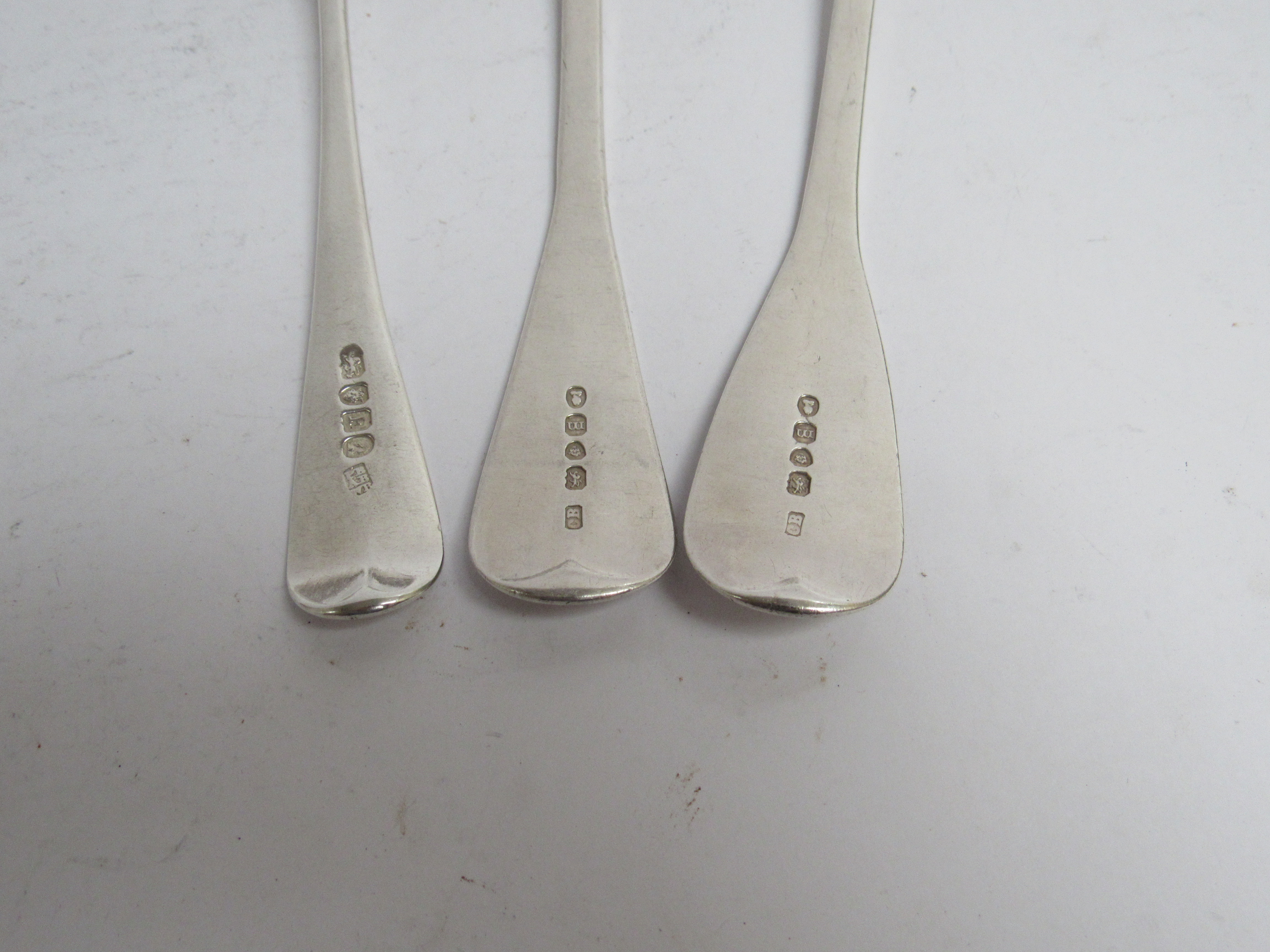 Six various Georgian serving spoons, five with monogrammed handles, - Image 5 of 5