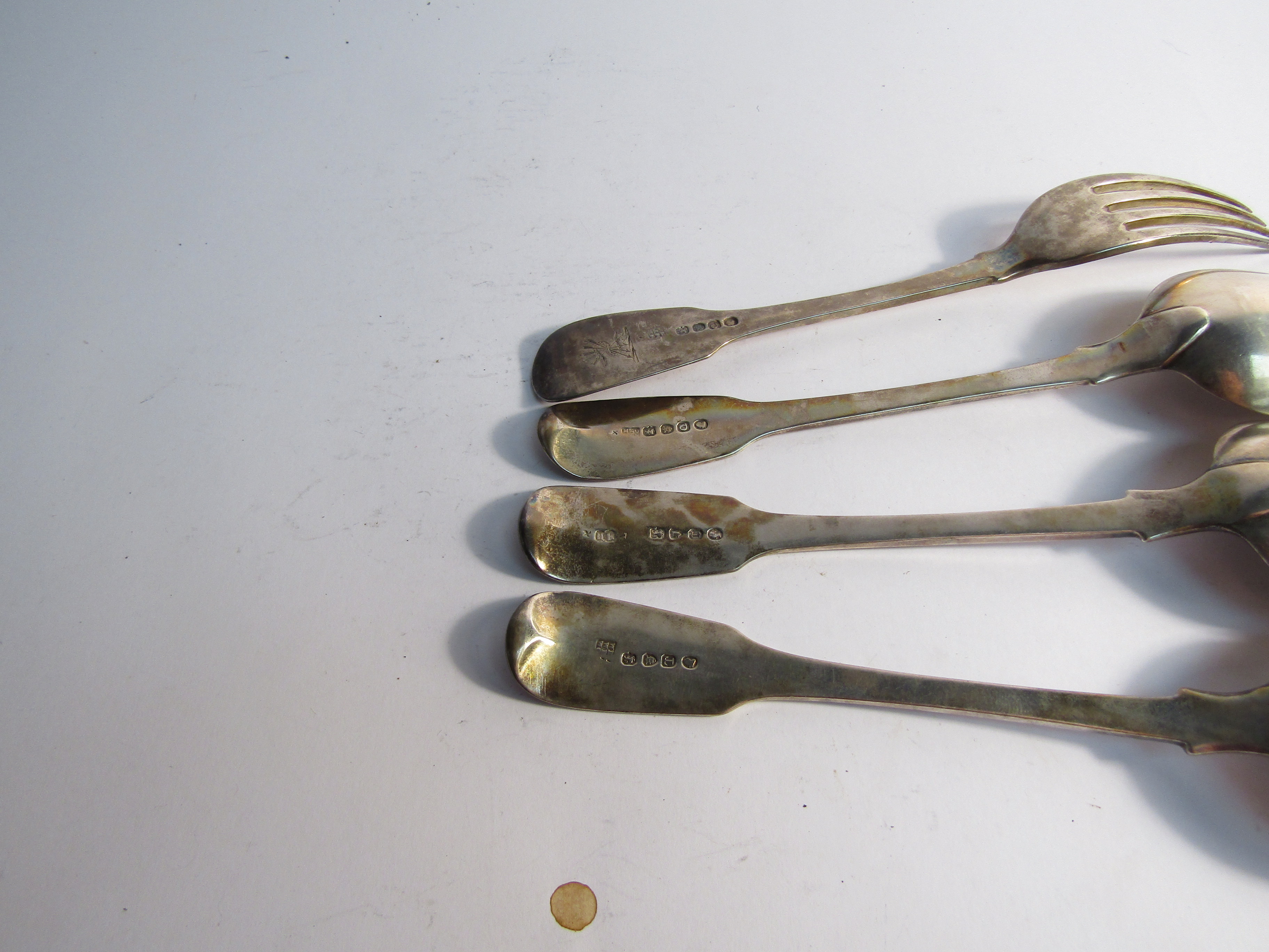 Victorian and Georgian silver flatware, three spoons and a fork all with matching crest, - Image 3 of 3