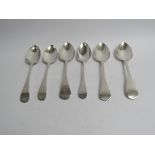 Six various Georgian serving spoons, five with monogrammed handles,