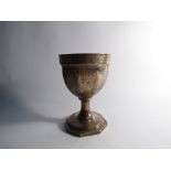 A George III William Fountain silver chalice with engraved body, monogrammed cartouches,