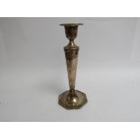 A Walker & Hall silver tall candlestick with octagonal top, marks rubbed, weighted base, 25.